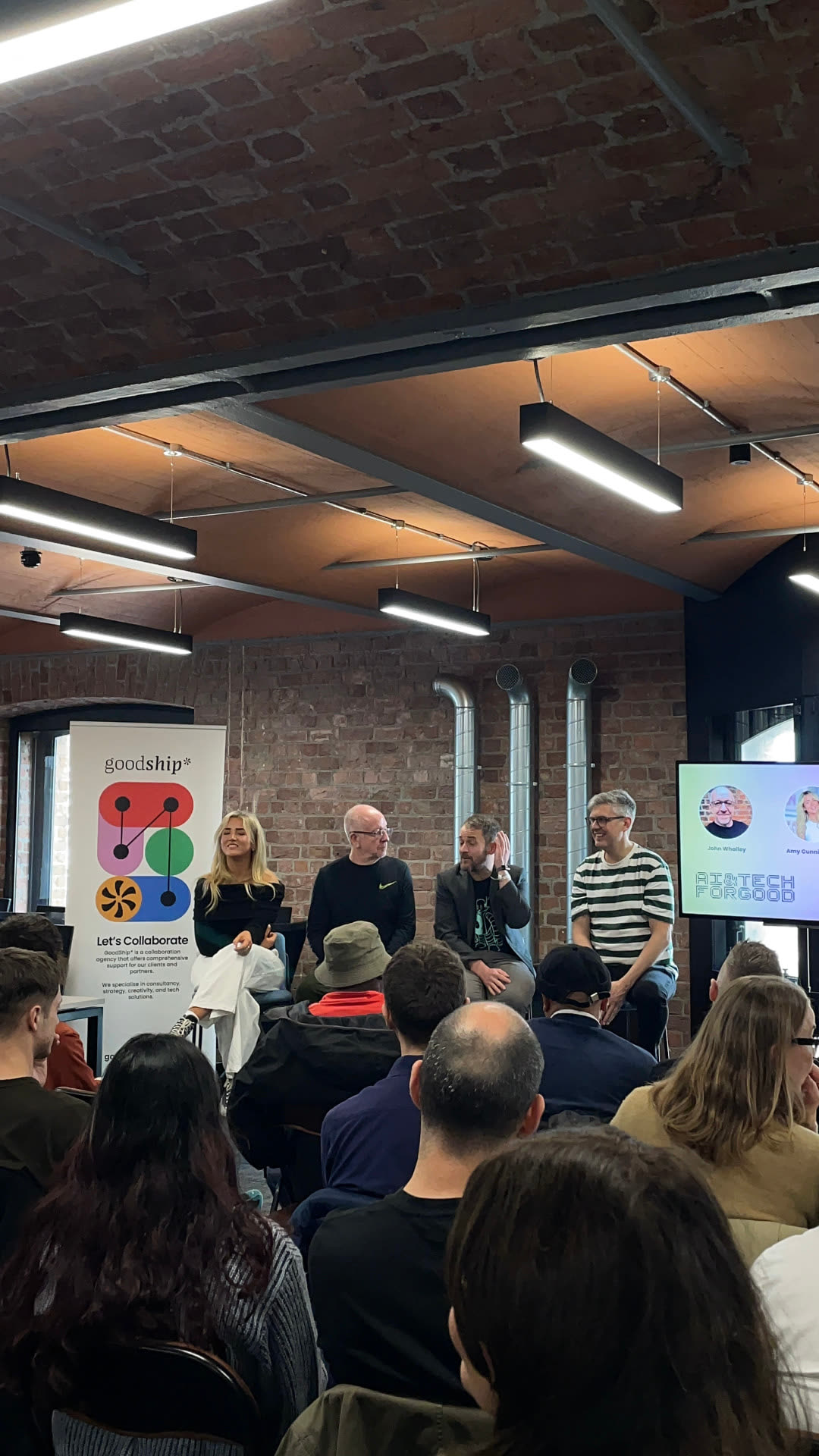 Panel discussion at a GoodShip* AI & Tech for Good session, with speakers answering questions from the audience.